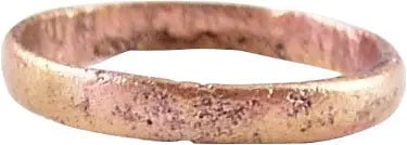 RARE VIKING WEDDING RING, 850-1050 AD JEWELRY SIZE 4 ½: Gilt bronze, size 4 ¼ for the small finger as was the custom. Low rounded section. The bandwidth 2.8mm. Made by casting with a central core to distribute the heat and molten bronze, which was the