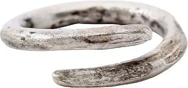 VIKING COIL RING, 10th CENTURY AD, SIZE 3 1/2: Silvered bronze. About size 3 1/2, slightly out of round, for wear on the small finger between the first two joints as was the custom. Round section band in 1 1/4 coils. Textured from burial. Sound we