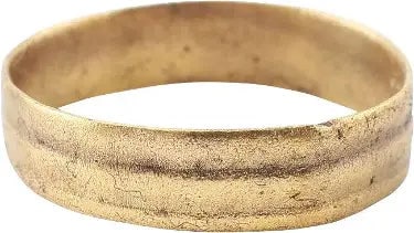 FINE VIKING WEDDING RING, 850-1050 AD, SZ 10 3/4: Gilt bronze, size 10 3/4, 5.0mm in width. The band face made of three low rounded segments, the center broadest, and those flanking it of different widths. Surface lightly textured from burial. Profes