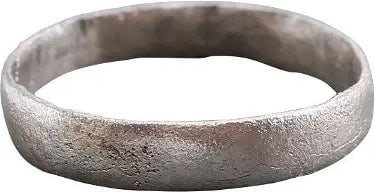 VIKING WEDDING RING, 850-1050 AD, SIZE 5 3/4: Silvered bronze, size 5 3/4. Low rounded face, band 3.3mm, width. Professionally refurbished with the silver overlay restored. Gift boxed with a Certificate of Authenticity. •Celtic Roman Viking