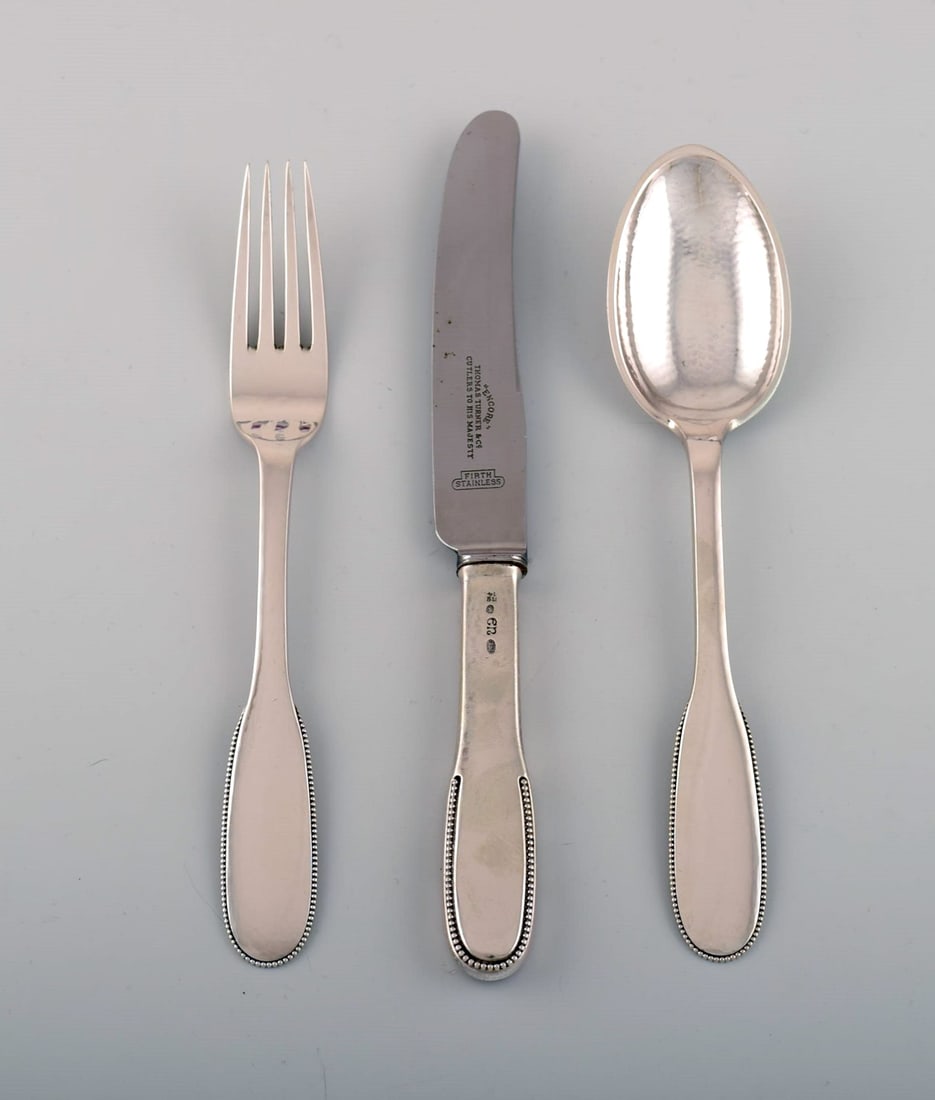 Evald Nielsen number 14 dinner service in hammered silver (830) for four people. 1920s. - 2