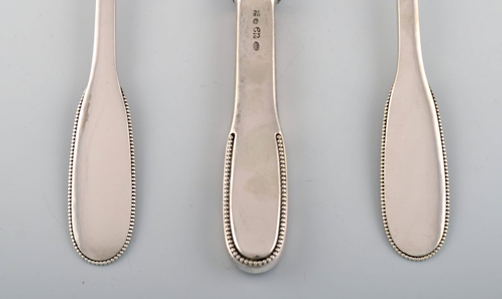 Evald Nielsen number 14 dinner service in hammered silver (830) for four people. 1920s. - 3