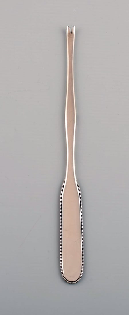 Three Evald Nielsen number 14 lobster forks in hammered silver (830). 1920s. - 2