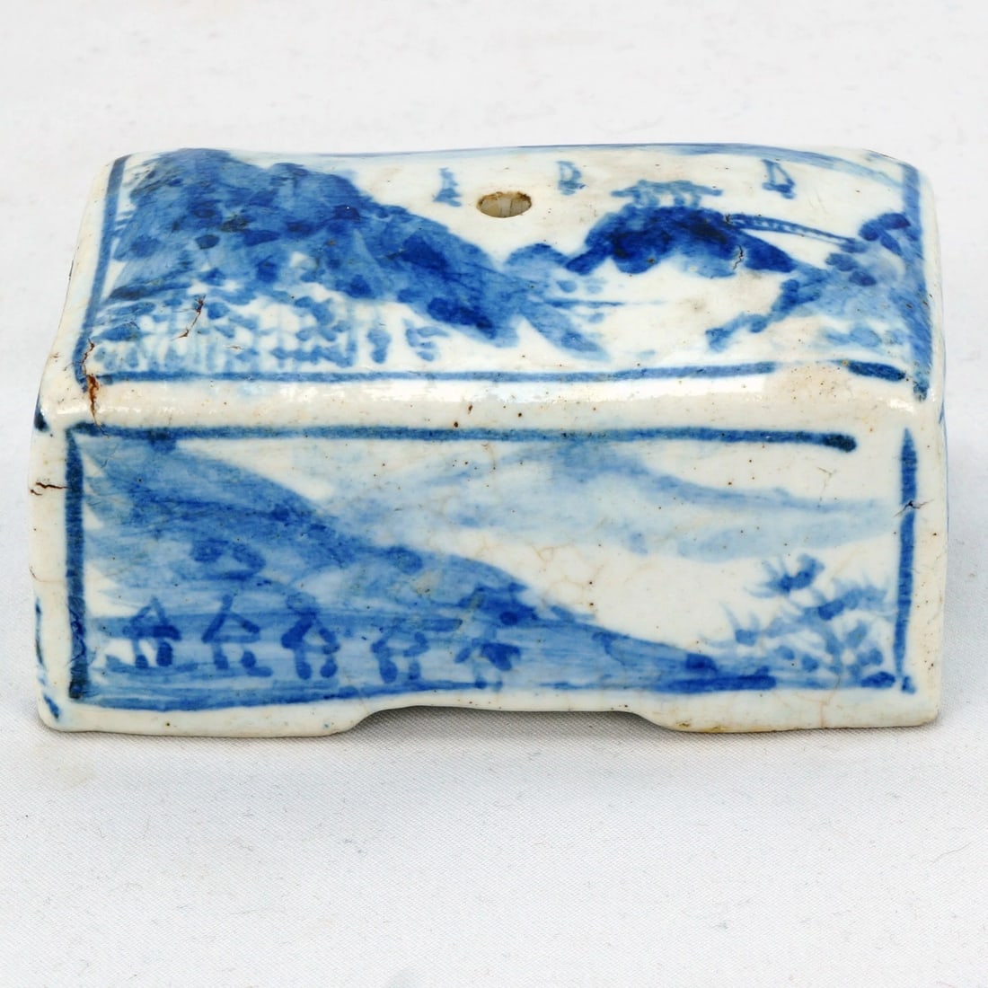 19th C Korean Porcelain Water Dropper: Title:19th C Korean Porcelain Water DropperSize:3 3/4 in (9.5 cm) long x 2 3/8 in (5.9 cm) deep x 1 3/4 in (4.4 cm) tall.Description:A hand-painted and hand-potted porcelain water dropper, crafted in