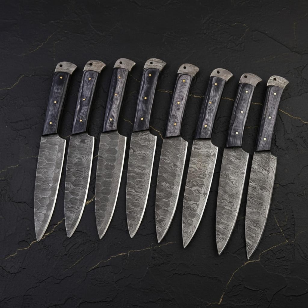 Set of 8 Hand Forged Damascus Steel Steak Knives - Black Wood Handles: Title:Set of 8 Hand Forged Damascus Steel Steak Knives - Black Wood HandlesDescription:This is a set of eight custom, hand-forged steak knives crafted from Damascus steel. The blades feature a