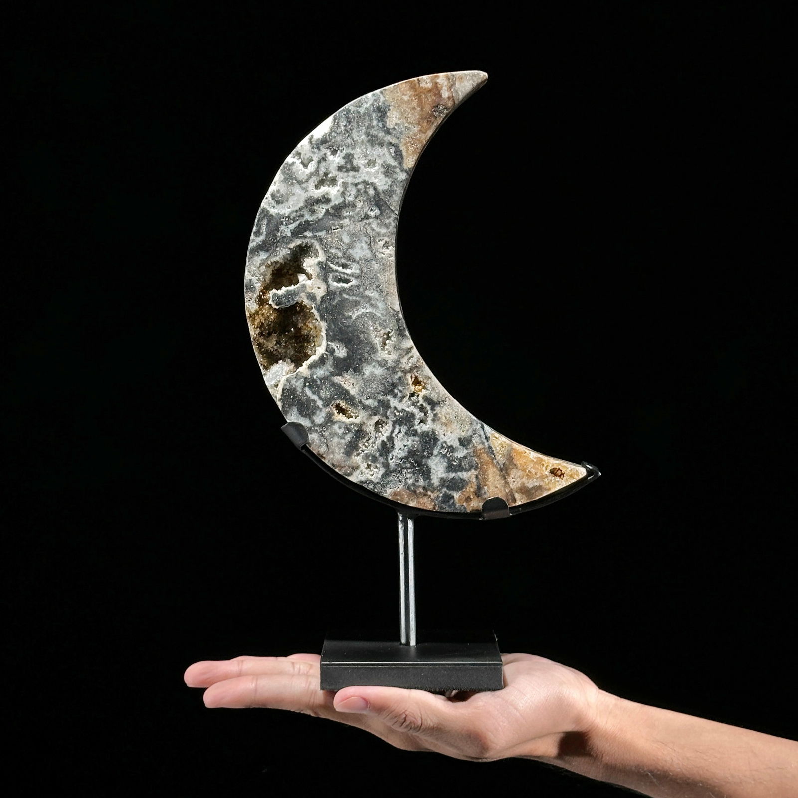A beautiful crystal quartz moon on a custom stand: Title: A beautiful crystal quartz moon on a custom stand Maker:Unknown Origin: Indonesia Date/Period:2025 Materials:Crystal Quartz, steel Dimensions:Height incl. stand: 27.7 cm / 10.9 inches Width: 16