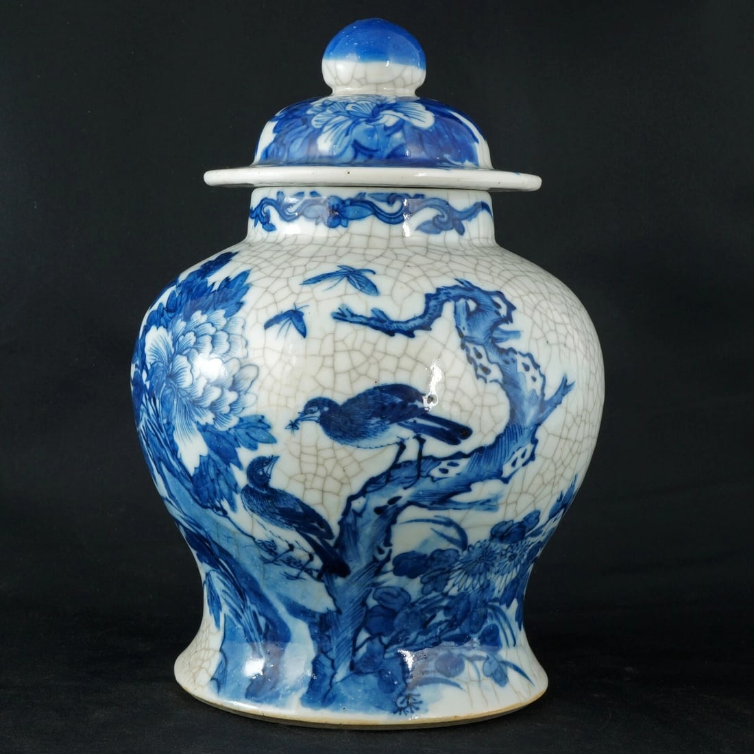 19th C Chinese Lidded Jar Kangxi Mark: Title:19th C Chinese Lidded Jar Kangxi MarkSize:7 in (17.8 cm) diameter x 10 in (25.4 cm) tall.Description:A hand painted and hand potted 19th Century Chinese ginger jar with a dark cobalt under