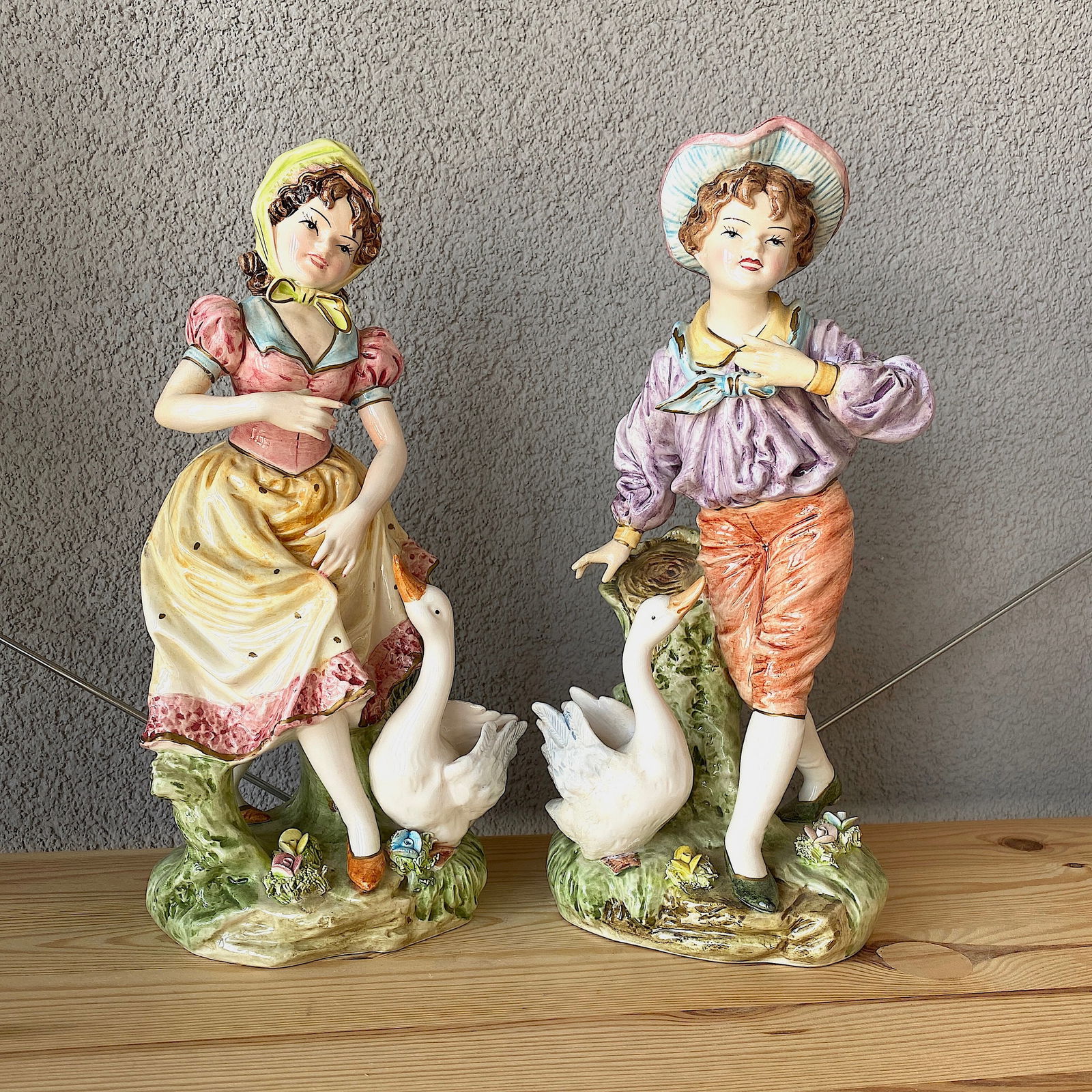 English porcelain figurines: Title: English porcelain figurinesMaker:UnknownOrigin: EnglandDate/Period:UnknownMaterials:PorcelainSize:Size: 14 x 12 x 33 cm - eachDescription:Size: 14 x 12 x 33 cm - each Reserve: $300.00 