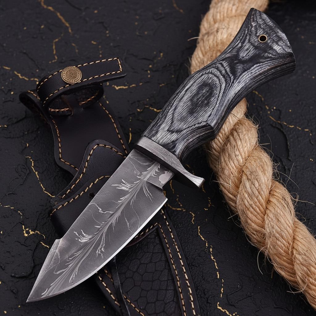Feather Pattern Damascus Steel Skinner Knife Hand Forged with Greywood Handle Sheath: Title:Feather Pattern Damascus Steel Skinner Knife Hand Forged with Greywood Handle SheathDescription:This collectible, hand forged knife features a stunning feather pattern Damascus steel blade.