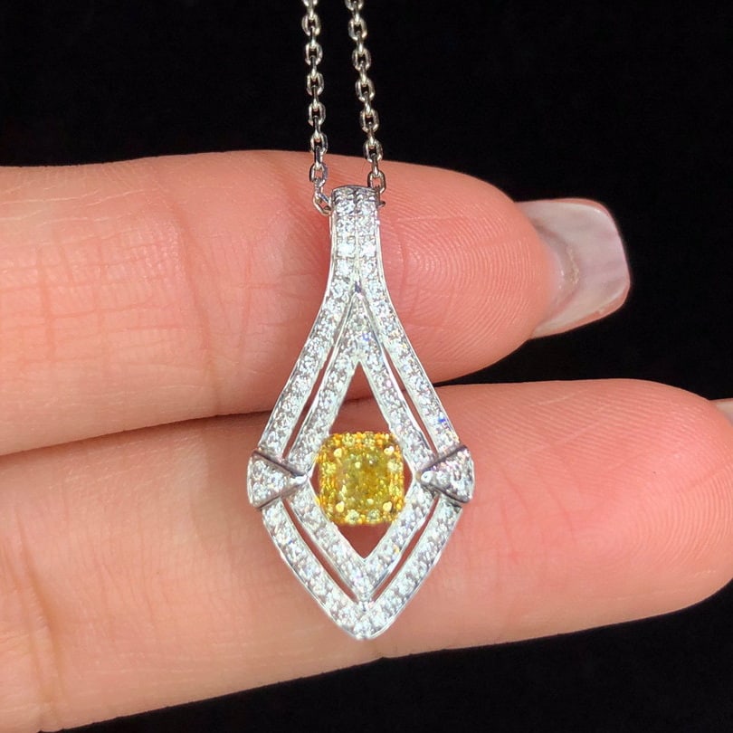14K GOLD 0.55 CTW NATURAL YELLOW DIAMOND & DIAMOND PENDANT: Title:14K GOLD 0.55 CTW NATURAL YELLOW DIAMOND & DIAMOND PENDANTDescription:Ref:230528510Gold Content:14K GoldMain Gemstone:Yellow DiamondNumber of stones:1Shape:CushionCarat Weight:0.20ct