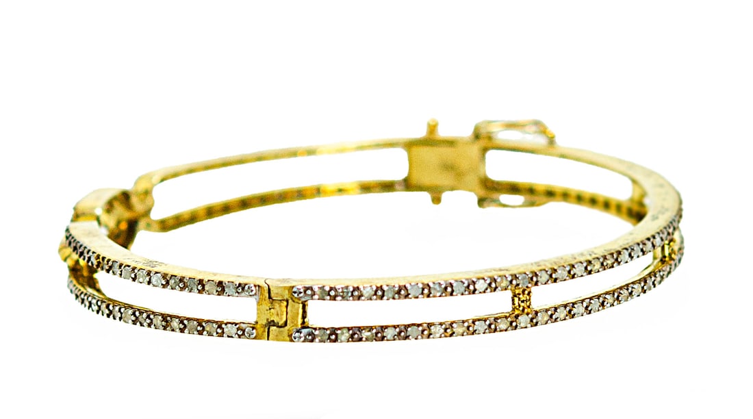 18K Gold-Plated 925 Silver Diamond Bracelet with Diamonds: Title:18K Gold-Plated 925 Silver Diamond Bracelet with DiamondsDescription:18K Gold-Plated 925 Silver Diamond BraceletSlim 18K gold-plated 925 sterling silver bracelet set with shimmering diamonds,