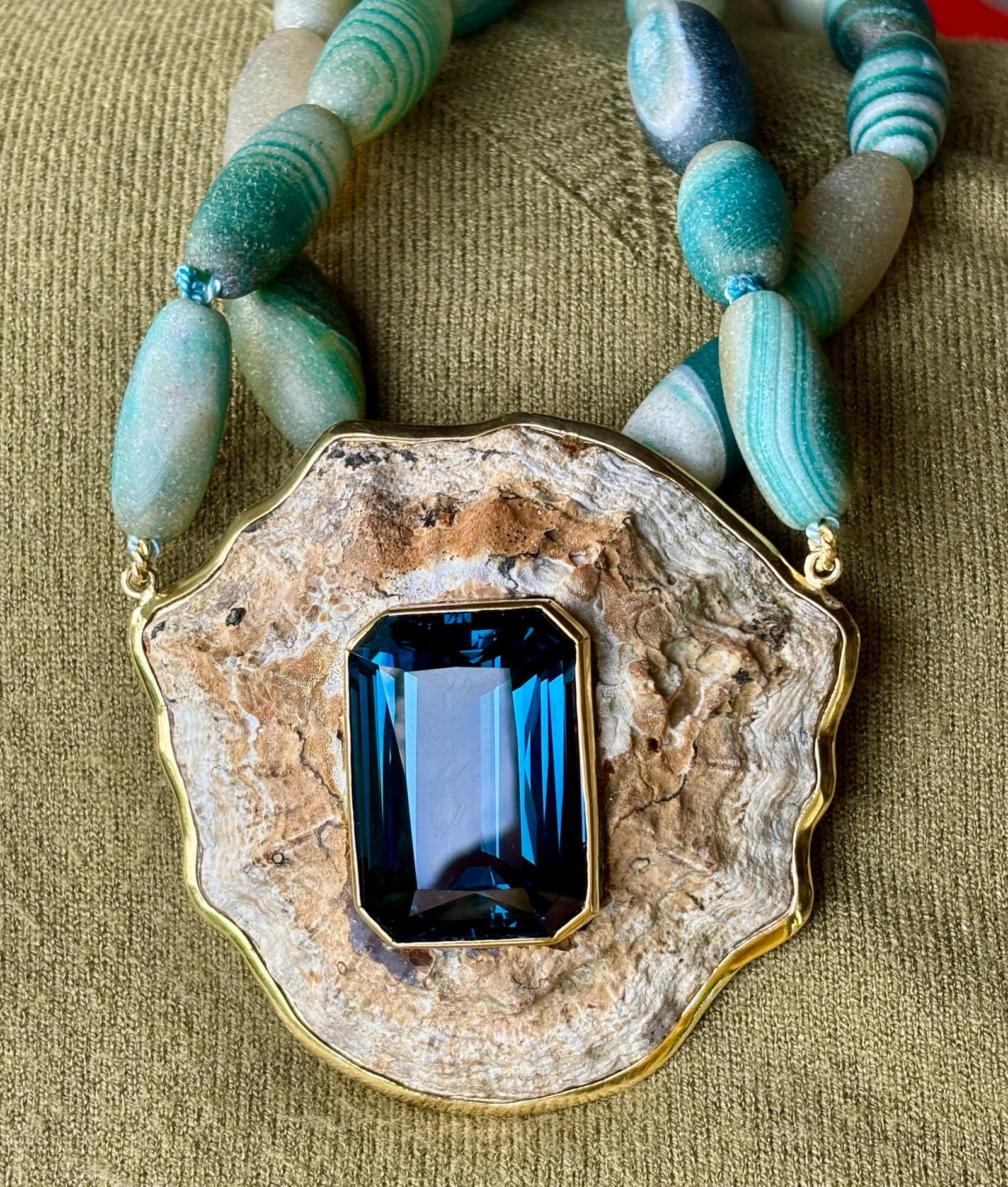 Boffo Botswana Beads, By-Product Shell and a Big, Blue Topaz: Title:Boffo Botswana Beads, By-Product Shell and a Big, Blue Topaz Description:Natural Botswana Barrel-Agate Beads in earthy tones of blues and turquoise, powered by a 135-Carat London-Blue Topaz set