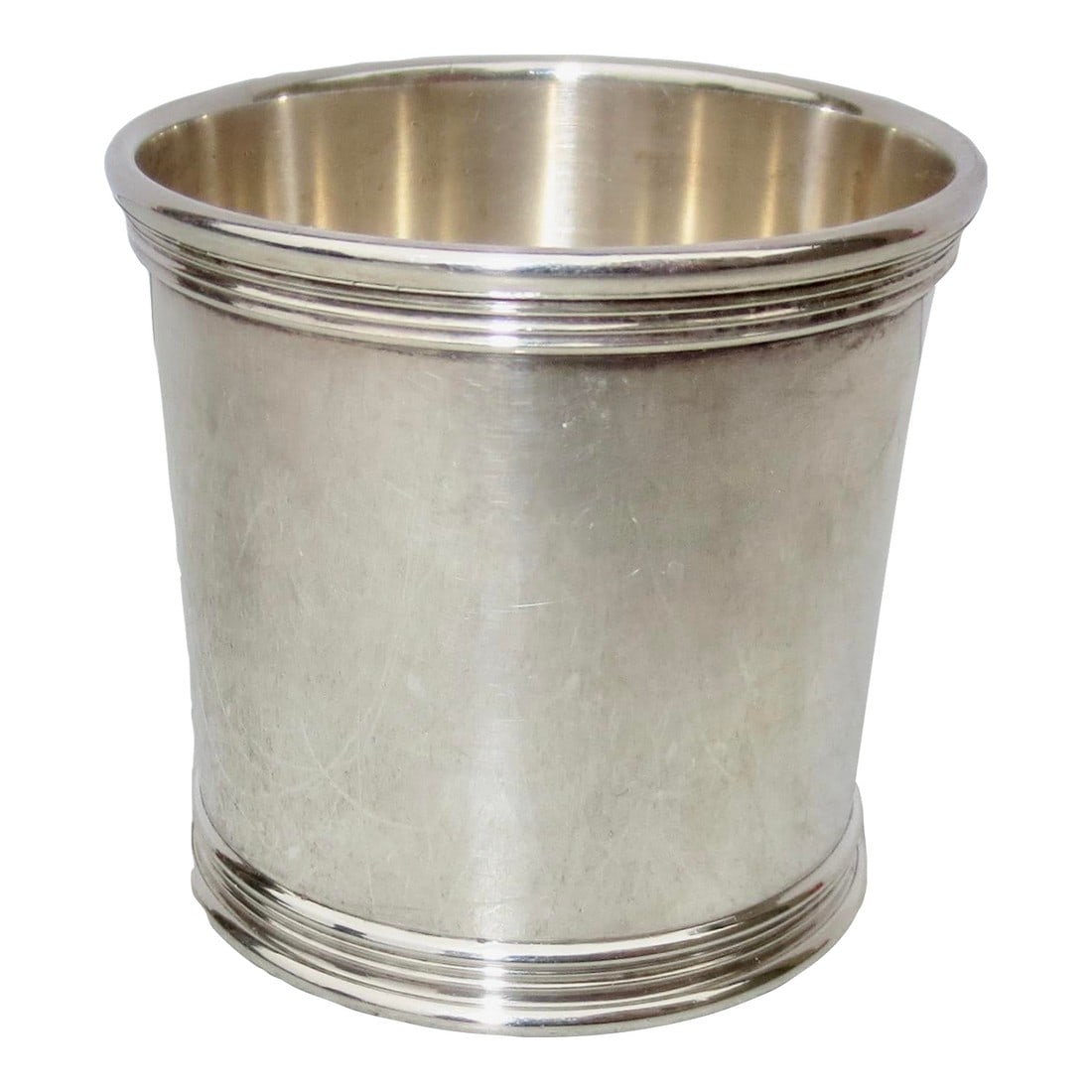 Tiffany Sterling Silver Beaker: Sterling silver beaker from Tiffany & Co. Marked Sterling and 37 to the bottom. Small beaker pours for bar service. The size is 1.75" tall and 2" in diameter, with rimmed bands at the lip and foot. 