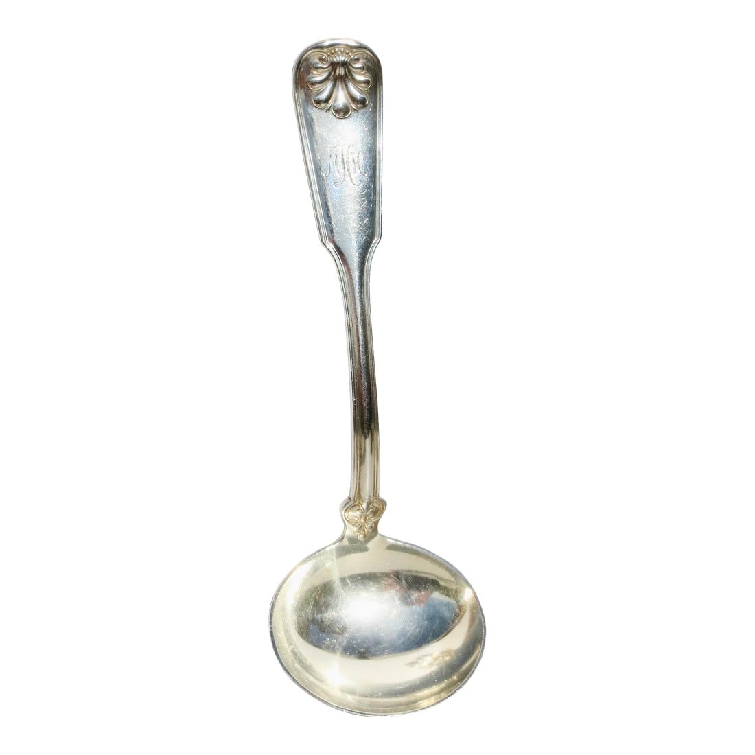 Antique Tiffany Sterling Ladle Circa 1905: Sterling silver gravy ladle by Tiffany. Shell and thread pattern antique 1905. Monogrammed to the handle MHH. The size is 7.25" long and 2.3" wide at the bowl. INV SFB 27A bx Condition: