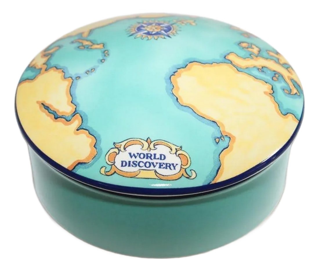 Tiffany & Co. For Tauck World France Porcelain Lidded Trinket Box: Tiffany & Co. porcelain round trinket box. Tiffany & Co. porcelain round map box designed for Tauck World, Made In France. The porcelain lid cover is decorated with a map of several continents;