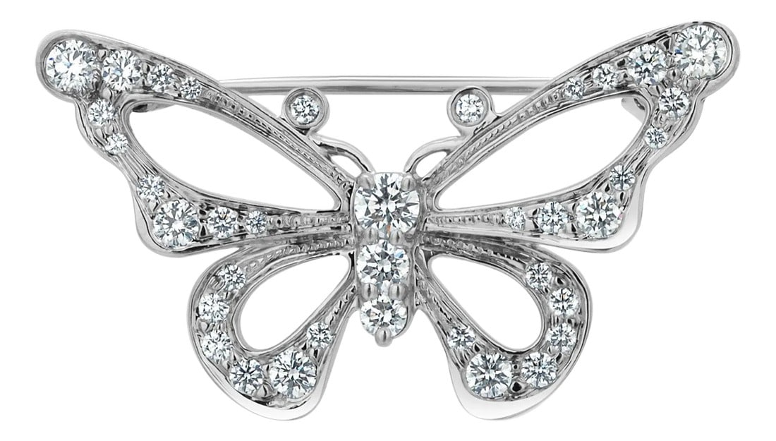 1990s Vintage Tiffany & Co. Platinum Diamond Butterfly Brooch: A Timeless Blend of Nature-Inspired Design and Tiffany's Refined Craftsmanship Enhance your jewelry collection with this Vintage Tiffany & Co. Butterfly Brooch, impeccably rendered in platinum and