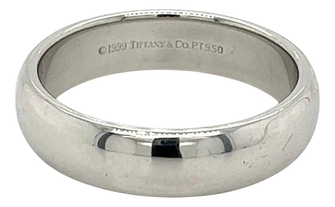 Tiffany & Co. Signed Platinum Wide Plain Wedding Band Ring 15 Grams, Estate: Tiffany & Co. Signed Platinum Mens Wedding Band Ring, Unisex Tiffany & Co. Platinum Wide Plain Wedding Band Ring, Estate From the house of Tiffany & Co. this men's or unisex wedding band, crafted in
