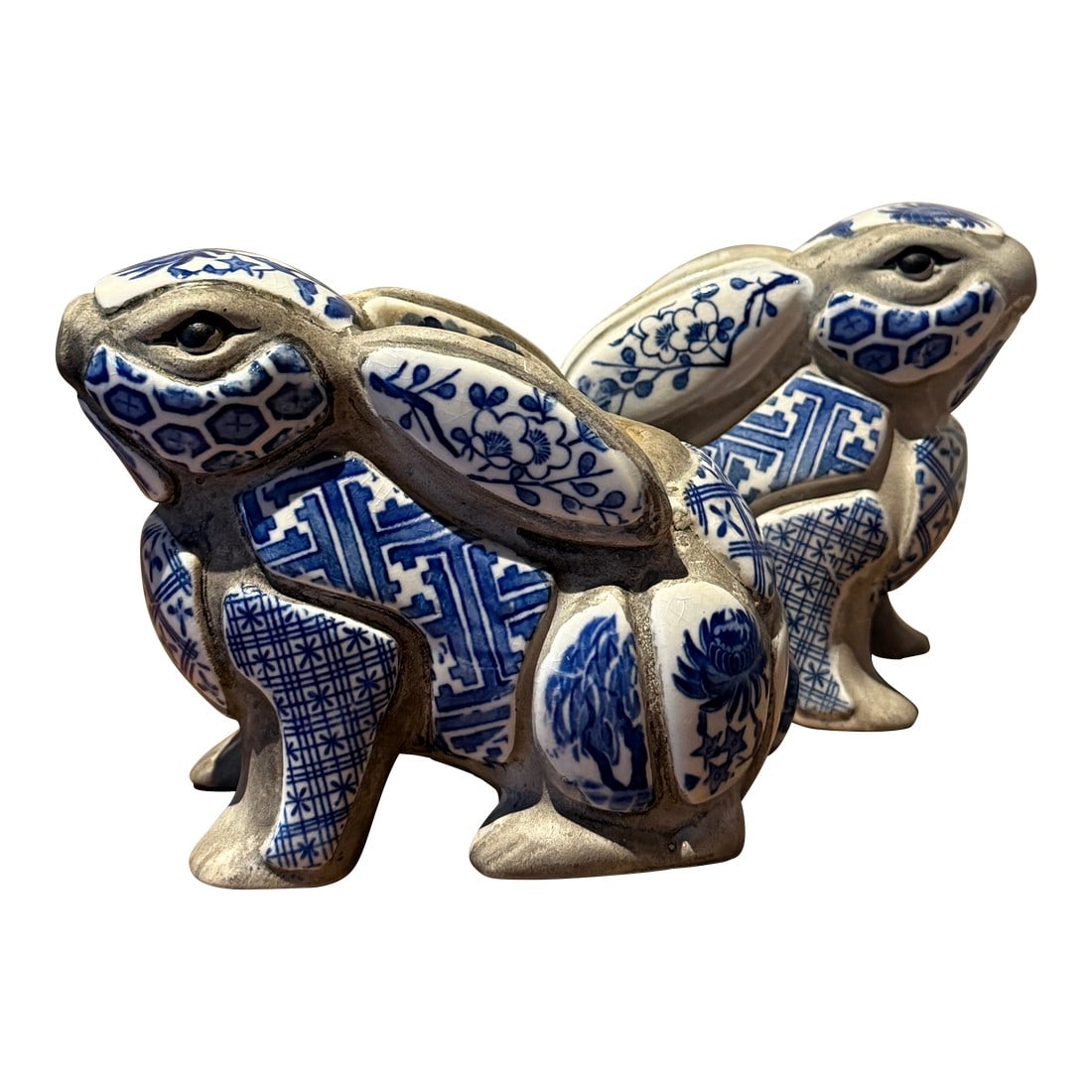 Blue and White Rabbit Candle Stick Holder Set Created by Artist Nancy Lopez in the 1980s Sold Throug: These pieces were created by artist Nancy Lopez in the 1980s and were sold through retailers like Tiffany & Co. this pair is made in 1980 They are about 5" long each. This pair came from Chicago