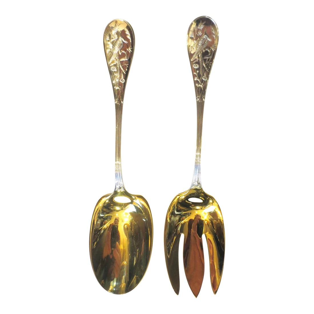 1980s Tiffany & Co. Sterling Salad Utensil Set - 2 Pieces: Tiffany & Co. Sterling salad set in pouch and Tiffany Box. Gilt wash on spoon and fork, reissued 1956 and in a silver pouch. The spoon is 9" and the fork is 9.25" in length, both in the Tiffany box. 