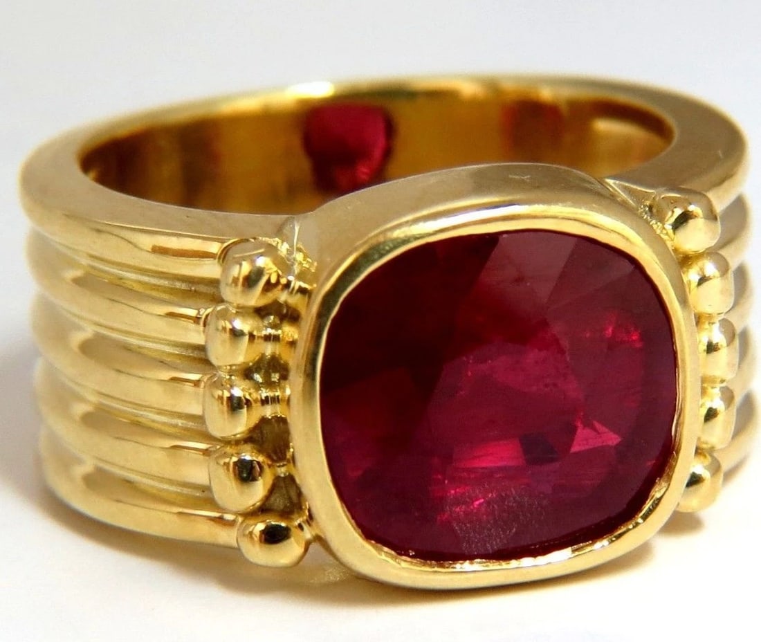 5.00ct Enhanced Ruby Greek Gesso Deco 14kt gold ring**: Title: 5.00ct Enhanced Ruby Greek Gesso Deco 14kt gold ring** Description: Greek Gesso Deco 5.00ct Natural cushion cut ruby ring. Prime Vivid Red color. Even tone. Mozambique Origin. Flux Enhanced /