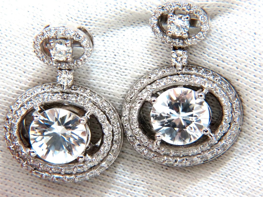 10.90CT NATURAL ZIRCON DIAMONDS DANGLE DROP EARRINGS 14KT**: Title: 10.90CT NATURAL ZIRCON DIAMONDS DANGLE DROP EARRINGS 14KT** Description: ONLY MAGNIFICENT JEWELS 8.10ct. Natural Matching round zircons & 2.80ct natural diamonds earrings. Zircon, clean clarity