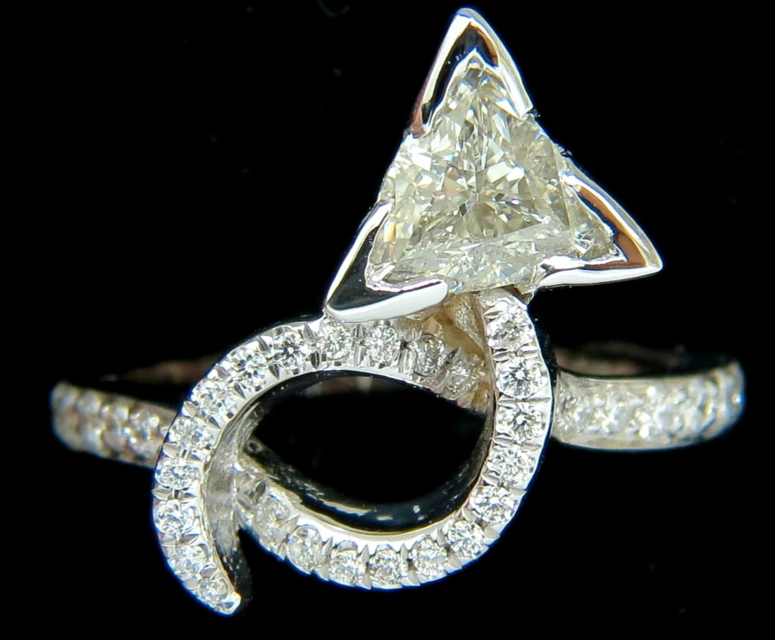 1.56CT TRILLIANT DIAMOND CROSSOVER RING MODERN ERA 14KT +: Title: 1.56CT TRILLIANT DIAMOND CROSSOVER RING MODERN ERA 14KT + Description: The Crossover wrap. Seems like shank of ring has been crossed over & diamond as tassel. In reality its one nice ring, mode