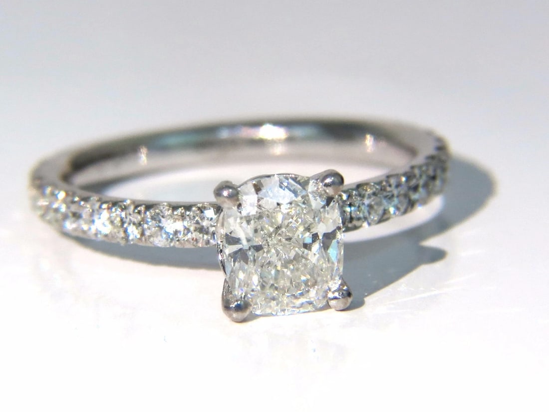 GIA 1.62ct. Cushion cut diamond ring 18kt H/VS +: Title: GIA 1.62ct. Cushion cut diamond ring 18kt H/VS + Description: GIA 1.02ct cushion cut diamond ring. H-color vs-1 clarity Report Id: 1229939821 Please see attached photo for report. .60ct. round,