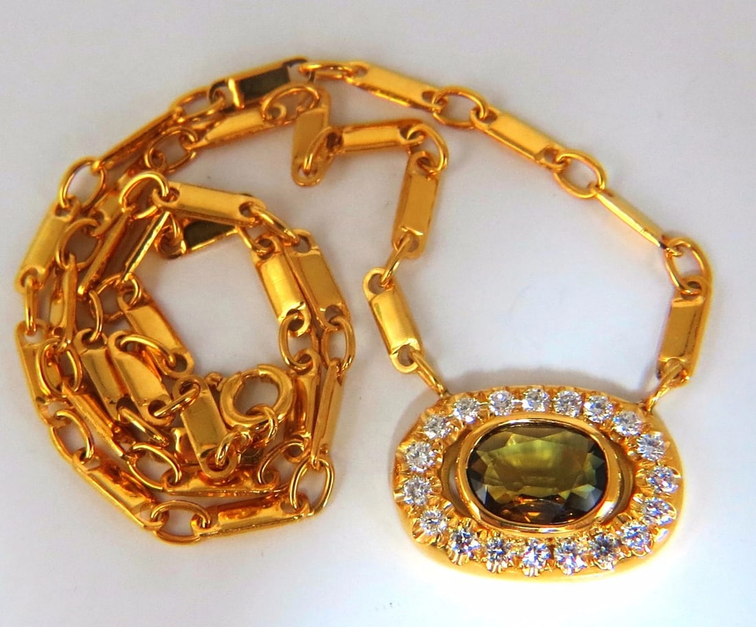 2.70ct natural orange brown sapphire diamonds necklace 18kt 14.25 inch **: Title: 2.70ct natural orange brown sapphire diamonds necklace 18kt 14.25 inch ** Description: MAGNIFICENT JEWELS 2.00ct. Natural Orange Brown Sapphire Necklace VS clean clarity Brilliant Oval cut