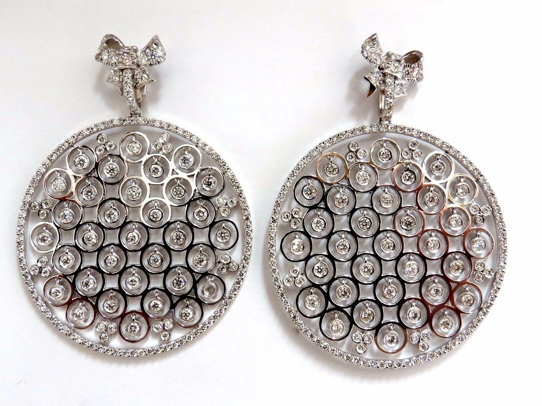 5.70ct natural diamonds floating grill dangle earrings 14kt circles**: Title: 5.70ct natural diamonds floating grill dangle earrings 14kt circles** Description: Circular diamond dangle earrings. 5.70cts of natural round diamonds: F/G-color, Vs-2 clarity. 14kt. white gold