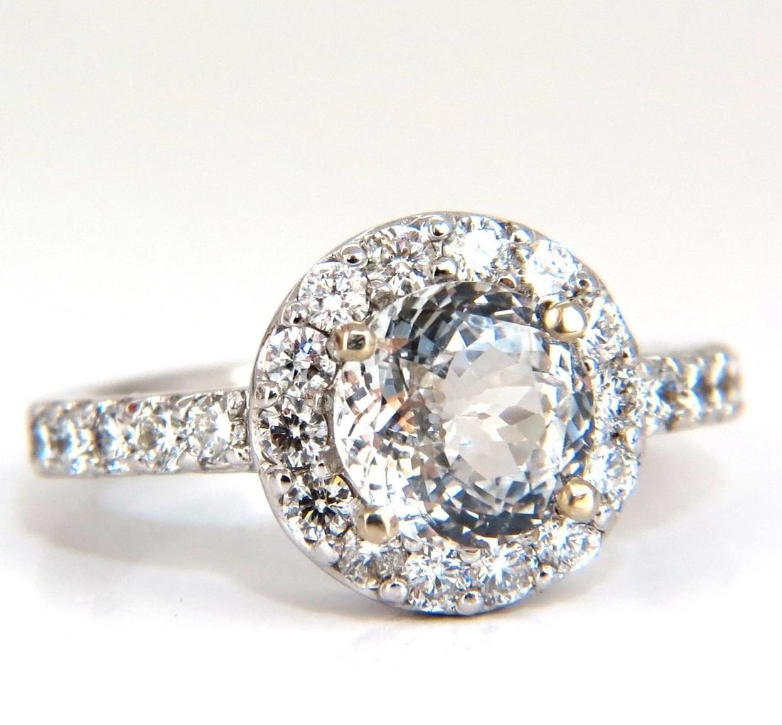 GIA Certified 3.28ct natural white sapphire diamonds ring 14kt halo prime: Title: GIA Certified 3.28ct natural white sapphire diamonds ring 14kt halo prime Description: White Halo Prime GIA Certified 2.18ct. Natural Sapphire ring GIA Certified Report ID: 1172412997 7.59 - 7.