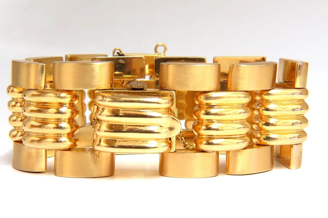 Estate LUVA 14kt gold watch ladies cuff bracelet**: Title: Estate LUVA 14kt gold watch ladies cuff bracelet** Description: MAGNIFICENT JEWELS Rare Gold "Luva" Ladies wide cuff watch. Watch is in working condition good condition overall gorgeous band de