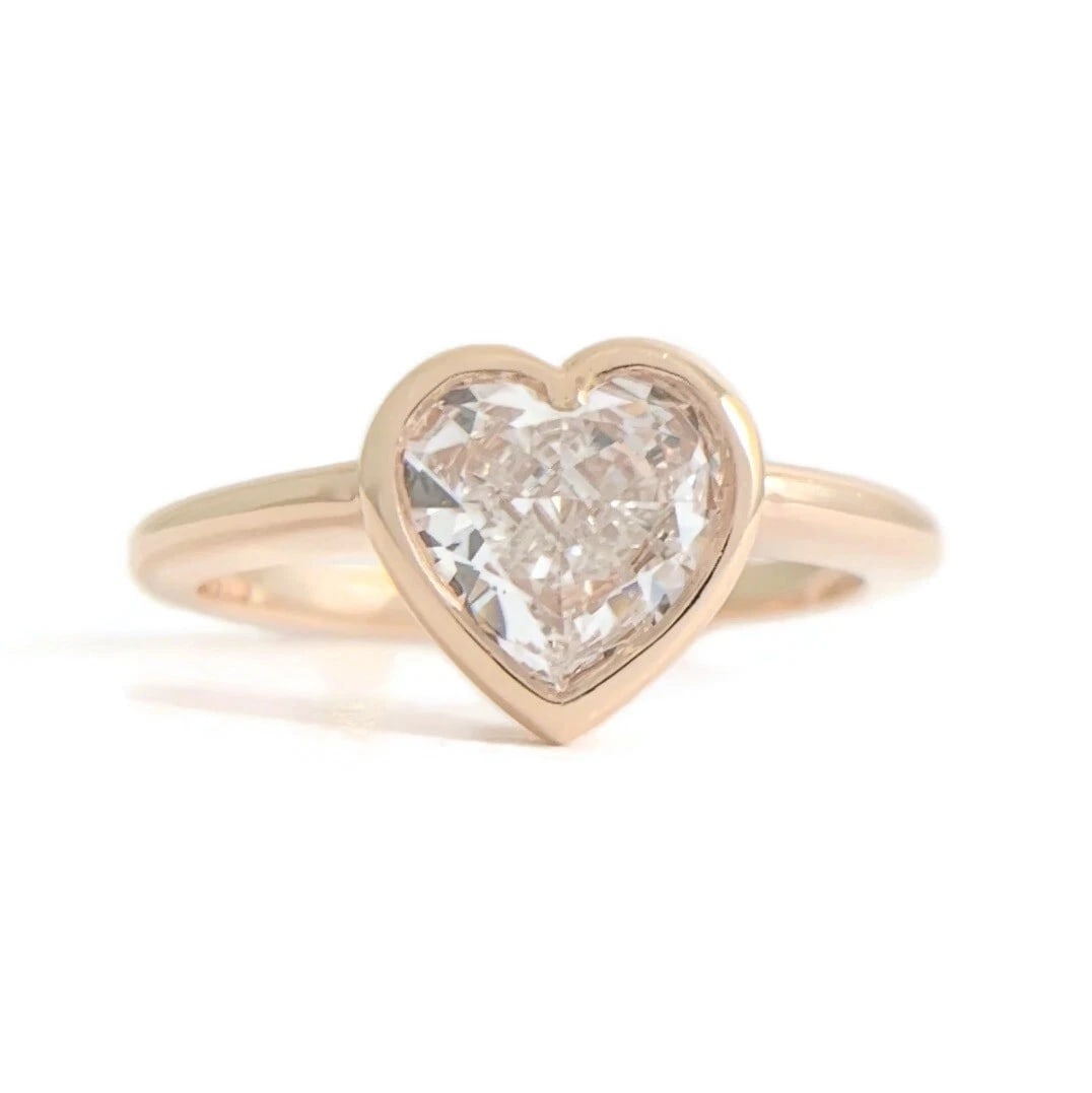 GIA Heart Bezel Solitaire Diamond Engagement Ring 14K Pink Rose Gold, .83 CT: GIA Heart Bezel Solitaire Diamond Engagement Ring 14K Pink Rose Gold, .83 CT This is a gorgeous diamond engagement ring! Diamonds: 1 heart cut .83 ct, F, VS2 Certificate: GIA Metal: 14K rose