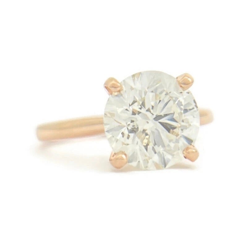 Round Solitaire Diamond 4-Prong Engagement Ring 14K Pink Rose Gold, 2.90 CT: Round Solitaire Diamond 4-Prong Engagement Ring 14K Pink Rose Gold, 2.90 CT This is a beautiful diamond engagement ring! Diamonds: one round brilliant cut 2.90 ct, K-L, SI1-SI2, excellent cut Metal: 1