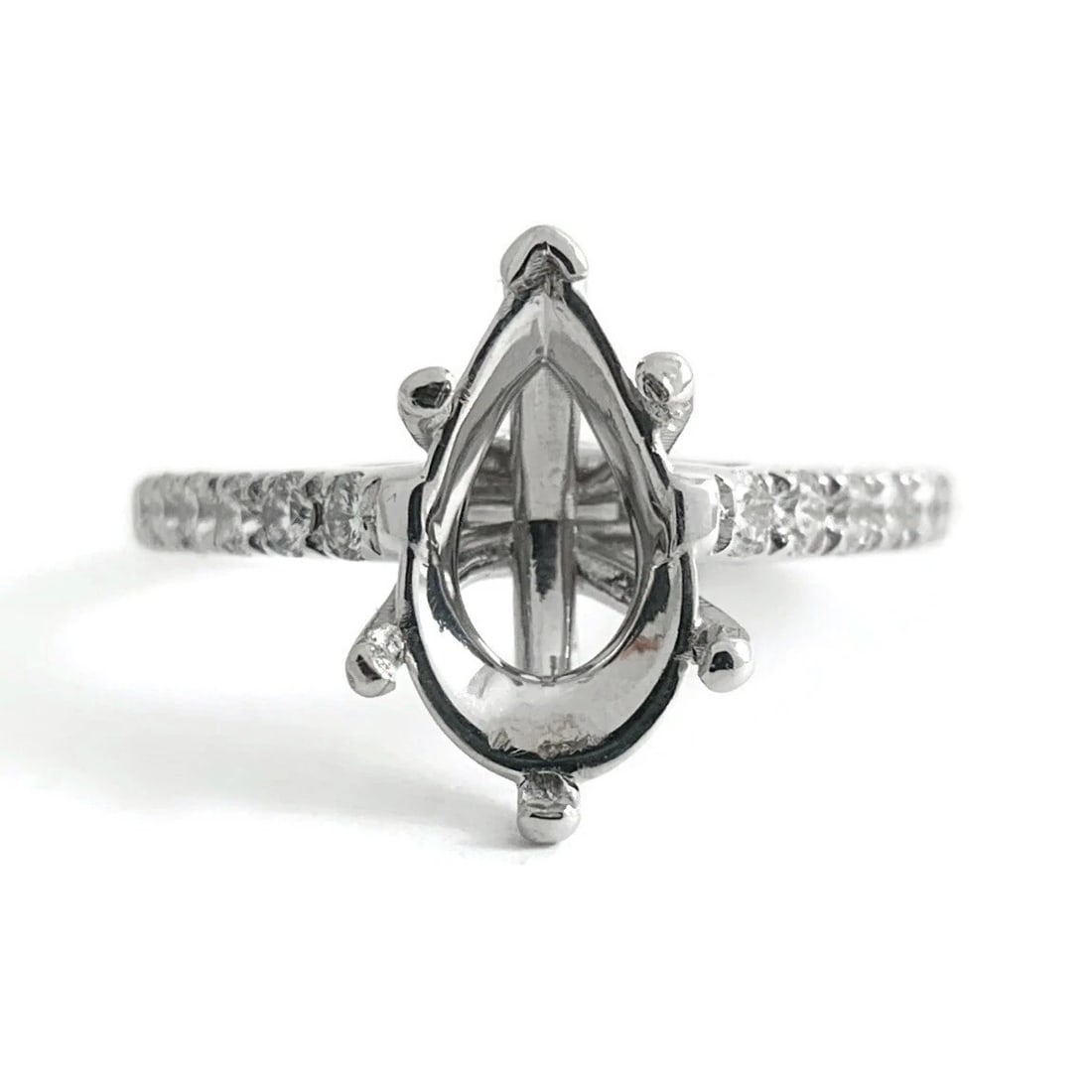 Pear Diamond Engagement Ring Setting Mounting 14K White Gold, .30 CTW, 3.22 Gram: Pear Diamond Engagement Ring Setting Mounting 14K White Gold, .30 CTW, 3.22 Gram Make a statement with this gorgeous setting! Ready to house a diamond or gemstone of your choice. Mounting: 6 prongs to