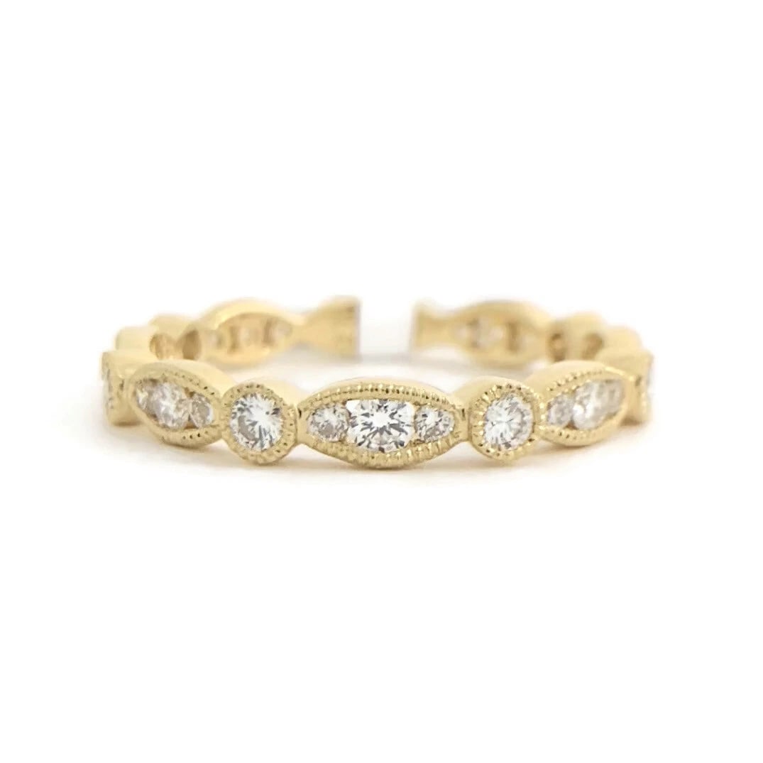 Marquise Round Bezel Diamond Wedding Band Ring 18K Yellow Gold, .59 CTW: Marquise Round Bezel Diamond Wedding Band Ring 18K Yellow Gold, .59 CTW This is a beautiful and stunning ring! Diamonds: 27 round brilliant cuts .59 ctw, G, VS2-SI1 Metal: 18K yellow gold Weight: 2.02