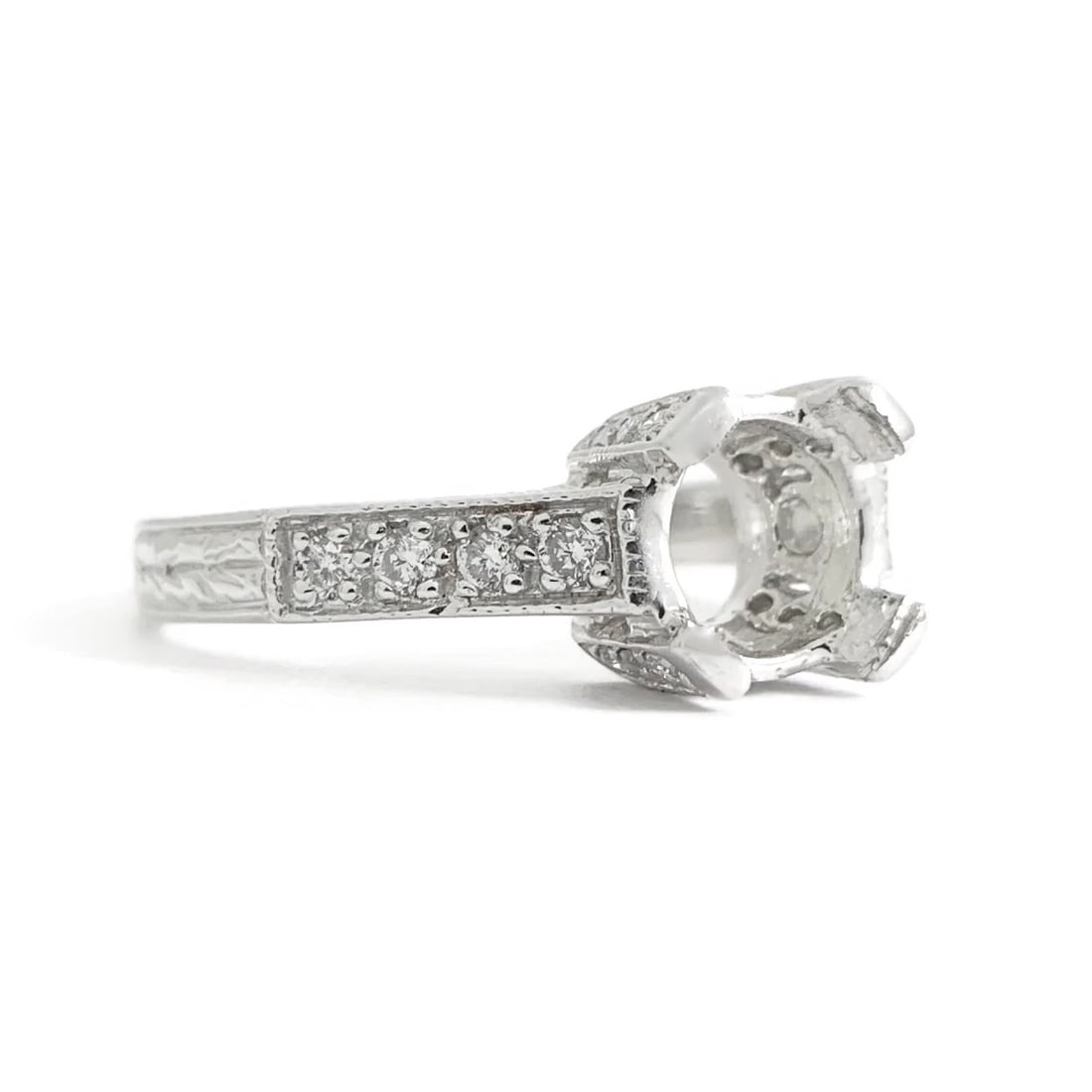 Pave Diamond Textured Engagement Ring Setting Mounting Platinum .25 CTW, 5.45 Gr: Pave Diamond Textured Engagement Ring Setting Mounting Platinum .25 CTW, 5.45 Gr This is a gorgeous diamond engagement ring mounting ready to house a diamond or gemstone of your choice. Don't hesitate