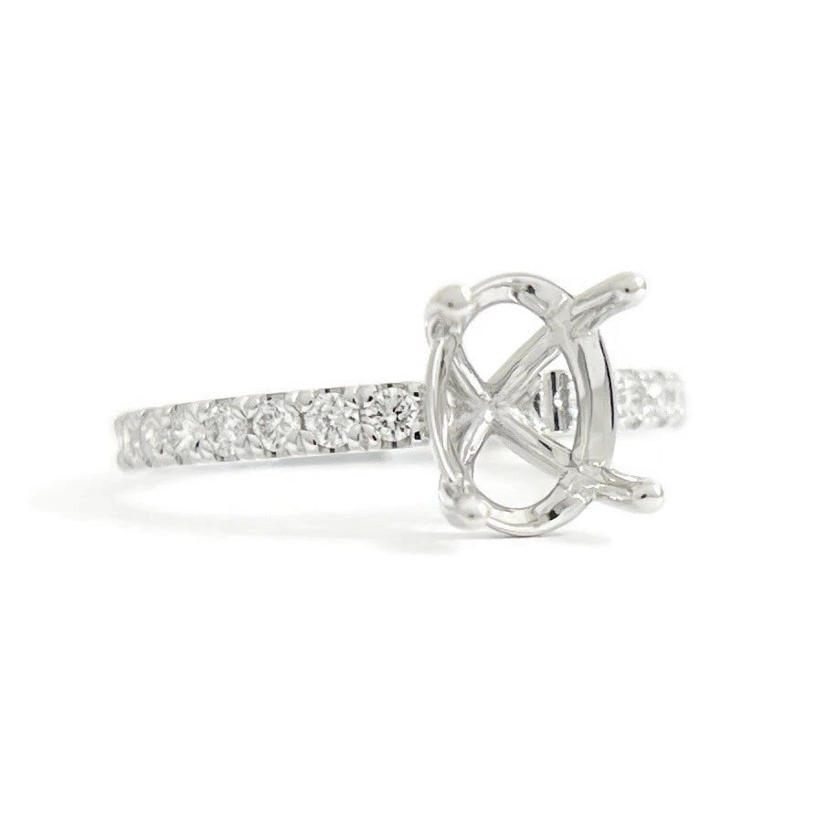 Oval Diamond Band Engagement Ring Setting Mounting 14K White Gold .35 CTW: Oval Diamond Band Engagement Ring Setting Mounting 14K White Gold .35 CTW This is a gorgeous diamond engagement ring mounting ready to house a diamond or gemstone of your choice. Don't hesitate to ask