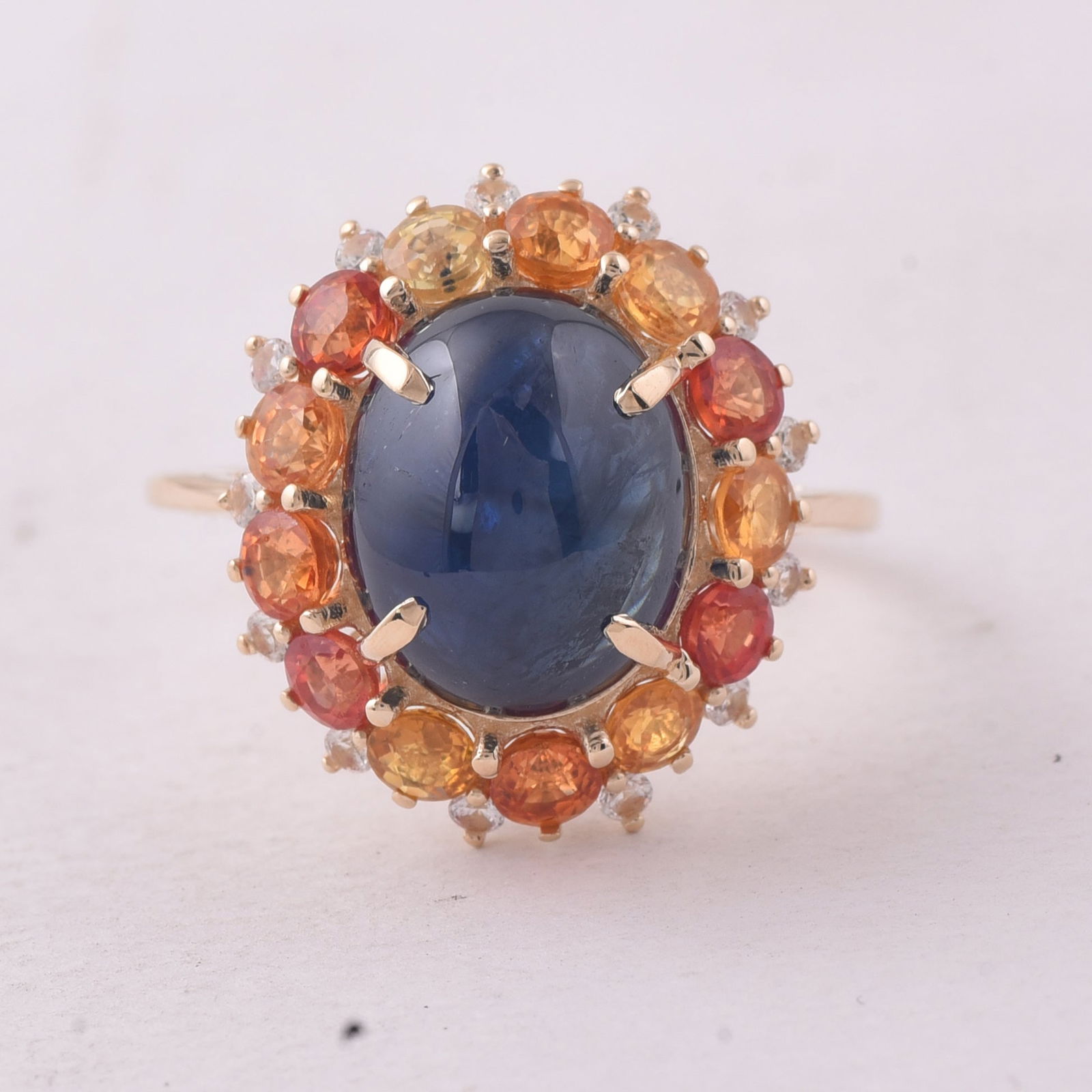 8.91 Ct Oval Sapphire 9K Gold Ring: 8.91 Total Carat Sapphire 9K Gold Ring Specifications - Total Weight 4.002 g - Center Gemstone Sapphire - Gemstone Carat Weight 6.38 Carats - Gemstone Measurements 10.40X9.40X6 mm - Additional Gemston