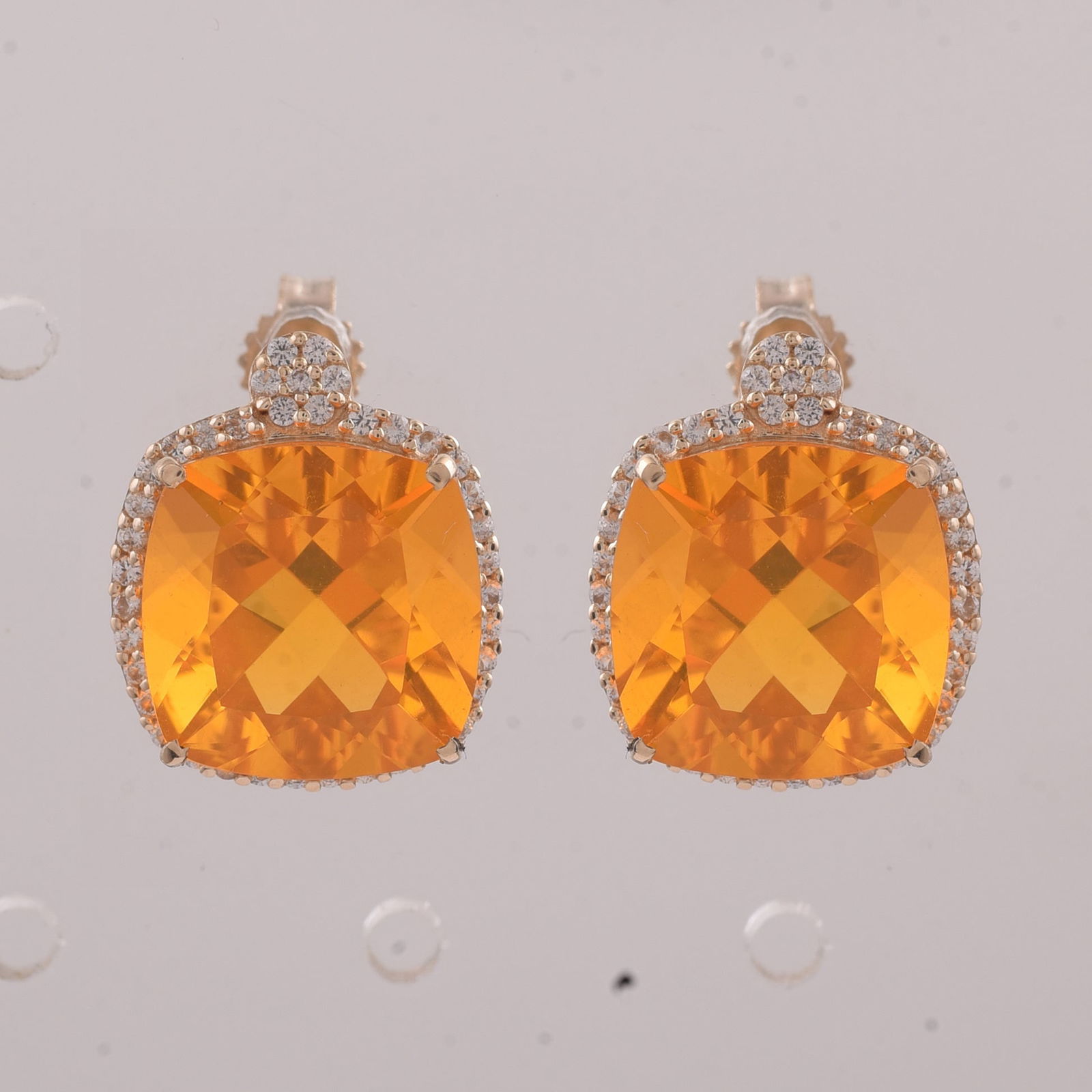 5.79 Ct Cushion Br.Opal 9K Gold Earrings: 5.79 Total Carat Br.Opal 9K Gold Earrings Specifications - Total Weight 2.847 g - Center Gemstone Br.Opal - Gemstone Carat Weight 5.47 Carats - Gemstone Measurements 10X10 mm - Additional Gemstones