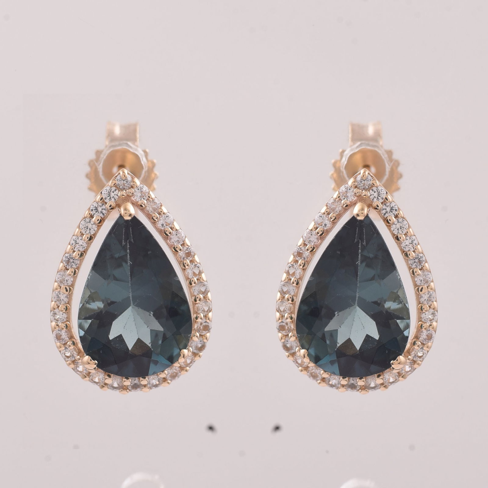 2.54 Ct Pear Tourmaline 9K Gold Earrings: 2.54 Total Carat Tourmaline 9K Gold Earrings Specifications - Total Weight 1.672 g - Center Gemstone Tourmaline - Gemstone Carat Weight 2.31 Carats - Gemstone Measurements 9X6 mm - Additional