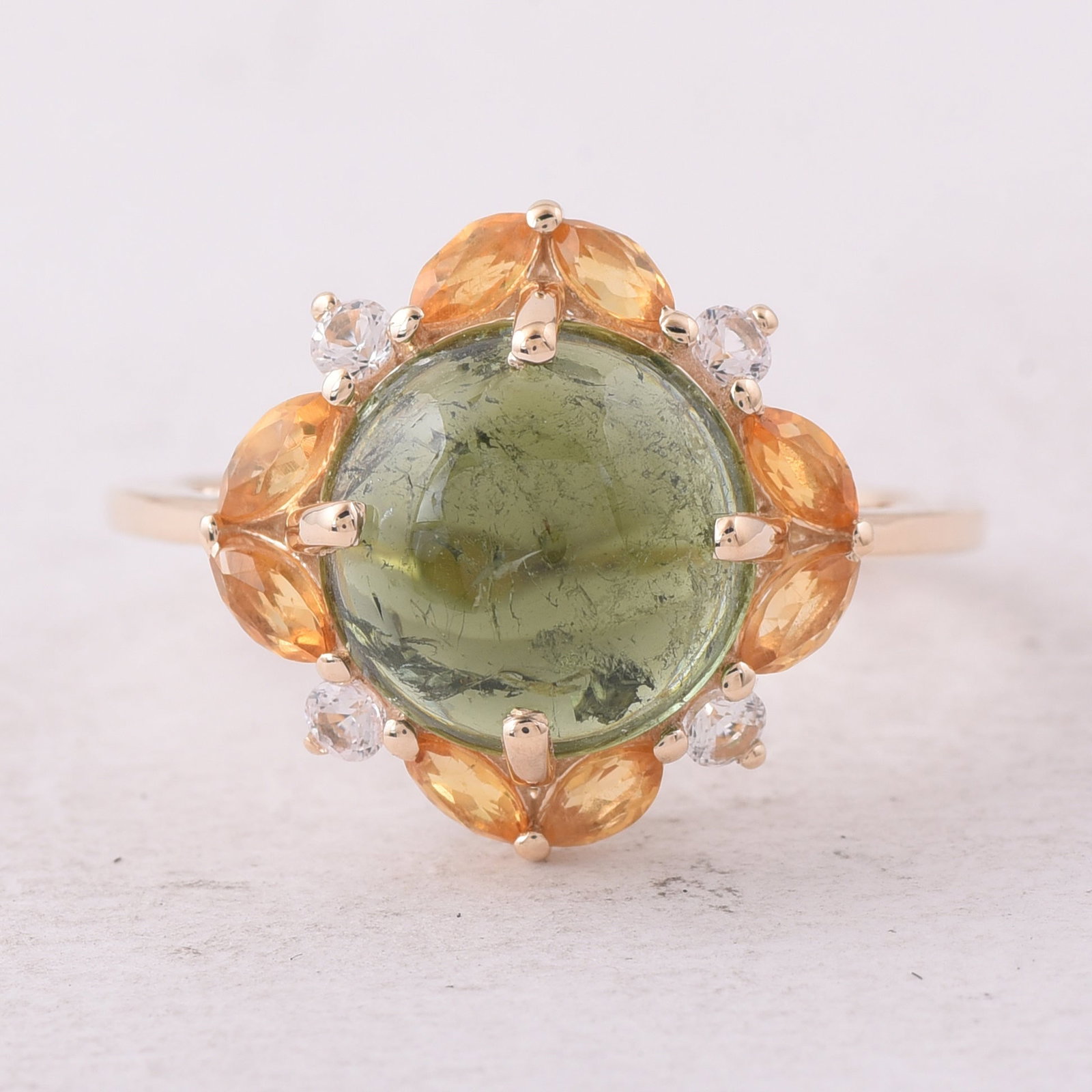 3.97 Ct Round Tourmaline 9K Gold Ring: 3.97 Total Carat Tourmaline 9K Gold Ring Specifications - Total Weight 2.672 g - Center Gemstone Tourmaline - Gemstone Carat Weight 3.33 Carats - Gemstone Measurements 10X10X4.60 mm - Additional