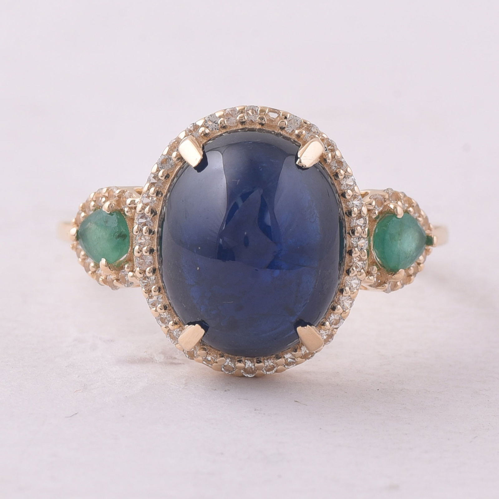 6.80 Ct Oval Sapphire 9K Gold Ring: 6.80 Total Carat Sapphire 9K Gold Ring Specifications - Total Weight 2.866 g - Center Gemstone Sapphire - Gemstone Carat Weight 6.27 Carats - Gemstone Measurements 11.30X9.40X6.20 mm - Additional