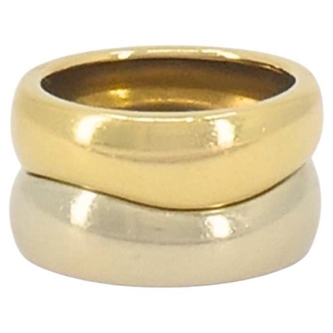 Vintage Cartier Love Me Band Ring Set 18k Gold: About the Item This vintage band ring set from Cartier’s Love Me collection includes one 18k gold ring in yellow gold and one in white gold. The two bands share the same smooth, rounded