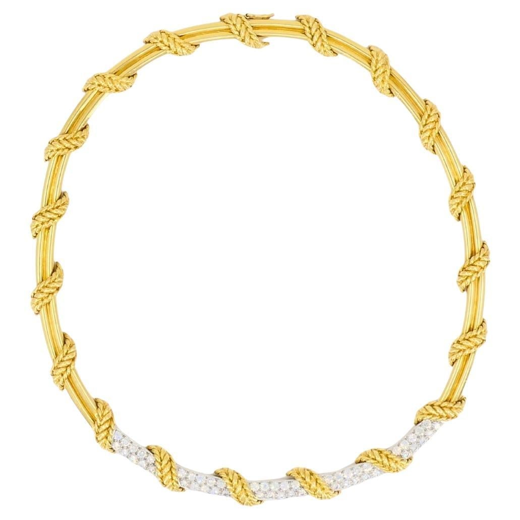 Tiffany & Co. 18k Gold Diamond Collar Necklace Rope Design: About the Item This vintage Tiffany & Co. collar necklace is crafted in 18 gold and features diamonds. The necklace is designed with an elegant rope motif that creates a fluid silhouette around the