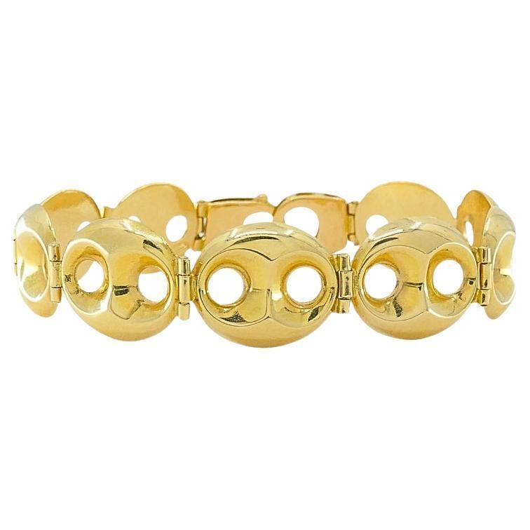 18k Yellow Gold Mariner Link Bracelet: About the Item MATERIALS: 18k Gold WEIGHT: 20.4 Grams MEASUREMENTS: 1/2” x 7 3/16" HALLMARKS: 750 ITEM DETAILS: This classic Mariner link bracelet is crafted in 18K yellow gold, featuring oval