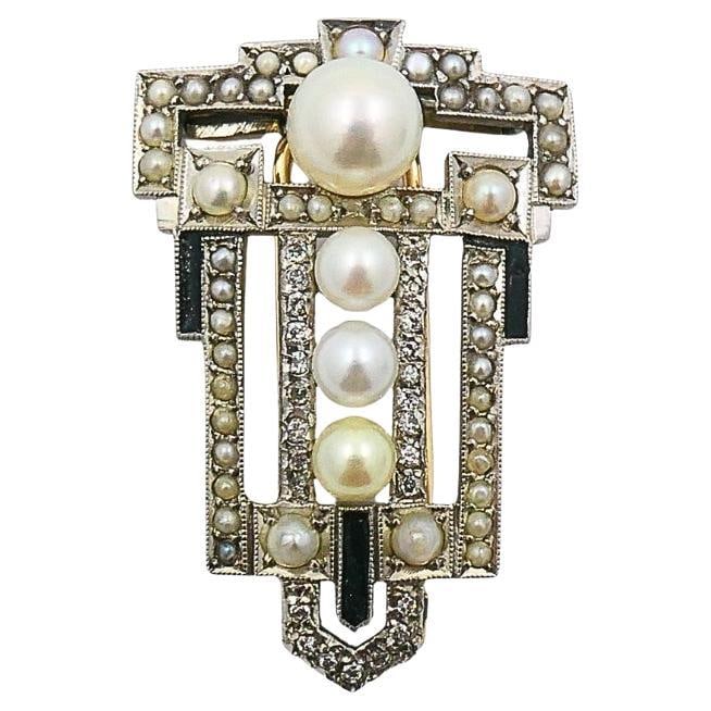 Art Deco Palladium Pearl Diamond Geometric Pin Brooch: About the Item Materials: Palladium Weight: 5.3 Grams Gemstone: Pearl, Diamonds Measurement: 7/8" x 1 5/16" A striking Art Deco brooch crafted in palladium, showcasing a bold architectural design