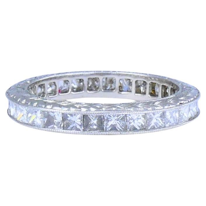M Beaudry Princess Cut Diamond Eternity Band Platinum Size 6.5 Wedding Ring: About the Item Crafted in platinum, this eternity ring by Michael Beaudry features a full circle of princess cut diamonds. Each stone sits flush against the next, creating a crisp, continuous row.