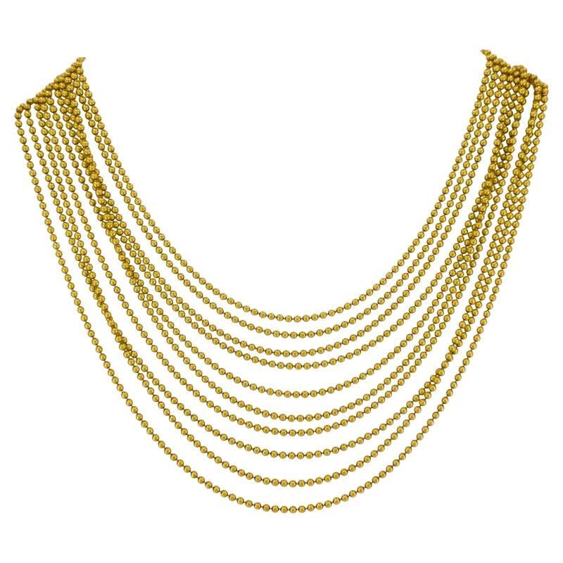 Cartier Gold Necklace Draperie 10 Strand: About the Item A spectacular Cartier Draperie 10 strand necklace crafted of 18k gold. This gold Cartier necklace carries fluidity and movement, inspired by the drape of soft fabric. It features