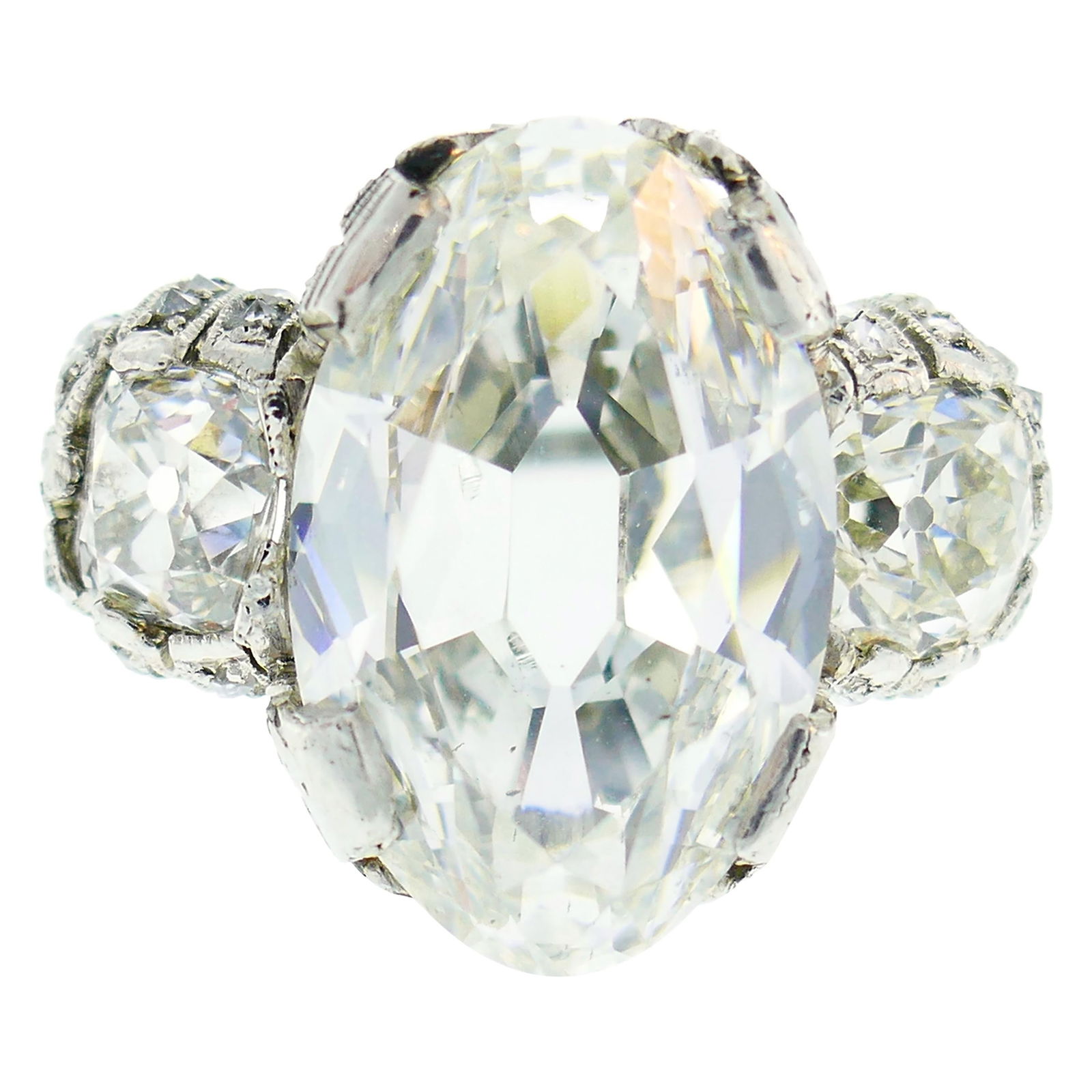 Art Deco 10.03 Carat Diamond GIA Platinum Ring: About the Item Magnificent, one-of-a kind Art Deco diamond ring! Features a 10.03-carat old oval brilliant cut diamond set in platinum and flanked by two old-mine cut diamonds. The center diamond