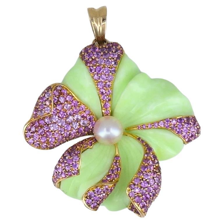 CARVIN FRENCH Chrysoprase Pink Sapphire Pearl Flower Pendant 18k Gold: About the Item A spectacular Carvin French chrysoprase, pink sapphire, and pearl flower pendant, crafted of 18k gold. The petals have a mix of smooth carved chrysoprase and pavé set pink